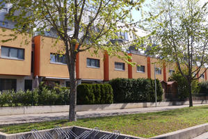 Apartment houses with light brown paint